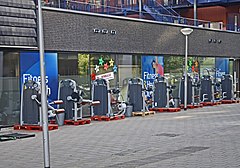 Exercise machines have been taken outside of a gym in Delft and placed on safe distance apart so that people could exercise while the gym itself is closed Delft gym exercise machines outdoors.jpg