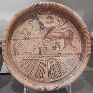 Plate in the Wild Goat style, showing a sphinx with geometric and floral motifs above a zone of petals