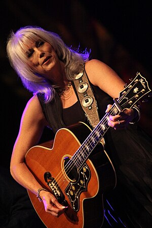 English: Emmylou Harris playing at the 2011 Gr...