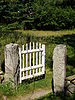 A small but elegant gate to a meadow path.