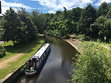 The Huddersfield Narrow Canal as it passes through the Queensgate campus. Huddersfield Narrow Canal Queensgate Campus.jpg