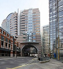 125 London Wall (1992) by Terry Farrell and Partners aimed to "repair the urban fabric" of the district, dominated by post-Blitz modernist schemes. London Wall (geograph 1209044).jpg