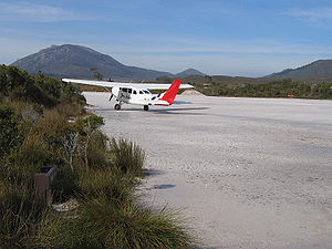 A tourist plane prepares for take-off from the...