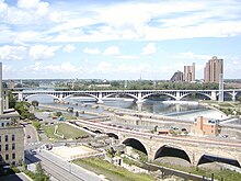 The Stone Arch Bridge, the Third Avenue Bridge and the Hennepin Avenue Bridge in Minneapolis (2004) Mississippi River from the Guthrie Theater.jpg