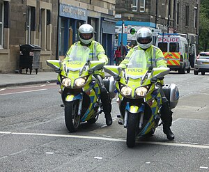 English: Motorcycle police in Gorgie Road, Edi...