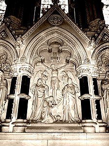 Crucifixion relief on reredos, Nun Monkton, 1873