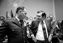 JCS chairman General George S. Brown with Secretary of Defense Donald Rumsfeld during testimony before the Senate Armed Services Committee on January 15, 1976. Secretary of Defense Donald H. Rumsfeld with Chairman of the Joint Chiefs of Staff General George S. Brown.jpg