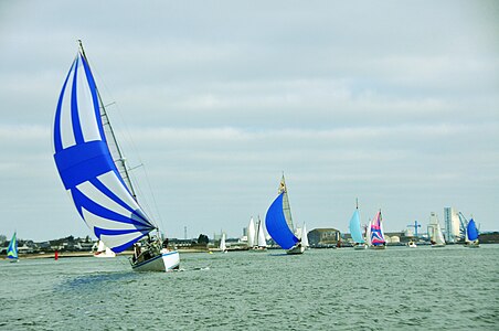 Boats and their spinnaker sails "running" in a regatta in Lorient, France.