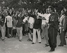 Kenneth Kaunda, an anti-colonial political leader from Zambia, pictured at a nationalist rally in colonial Northern Rhodesia (now Zambia) in 1960 The National Archives UK - CO 1069-124-8.jpg