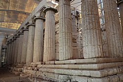 Partial view of the temple of Apollo Epikurios (healer) at Bassae in southern Greece The Temple of Apollo Epikourios at Bassae, east colonnade, Arcadia, Greece (14087181020).jpg