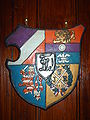Шчыт герба студэнцкага зямляцтва „Darmstadtia Gießen“ мае элемэнты: фарбы, герб Дармштату, герб Гесэну, «Знак зьвязу», цыркель.