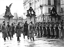 Hitler on his visit to Prague Castle after the establishment of the German protectorate. Bundesarchiv Bild 183-2004-1202-505, Prag, Burg, Besuch Adolf Hitler.jpg