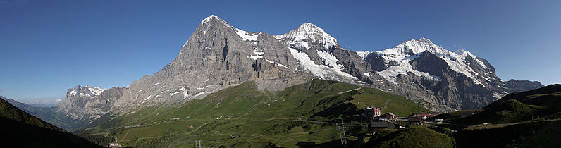 The Eiger (left), Mönch (middle) and Jungfrau (right) massif. The observatory is located on the saddle between the Mönch and Jungfrau (see image with description labels).