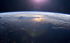 This view of Earth's horizon as the sun sets o...