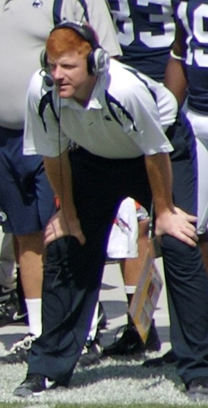Mike McQueary coaching from the sideline