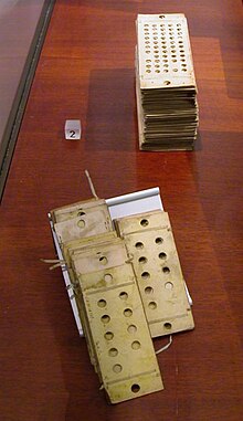 Two types of punched cards used to program the machine. Foreground: 'operational cards', for inputting instructions; background: 'variable cards', for inputting data PunchedCardsAnalyticalEngine.jpg