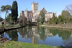 Wells Cathedral in the reflecting pool in the grounds of the Bisops Palace 4.jpg