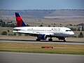 Image 52An Airbus A319 waits at Billings Logan International Airport. (from Transportation in Montana)