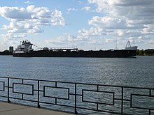 The Detroit River is one of the busiest straits in the world. Lake freighter MV American Courage passing the strait. American Courage.jpg