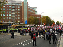 Protesters outside the BBC Television Centre, protesting against Griffin's invite to appear on Question Time Anti BNP protestors and police outside BBC Television Centre.jpg