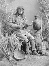 Chasi, a Warm Springs Apache musician, playing the Apache fiddle, 1886 Apachefiddler.jpg