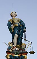 Lady Justice with sword, scales and blindfold on the Gerechtigkeitsbrunnen in Berne, Thụy Sĩ—1543