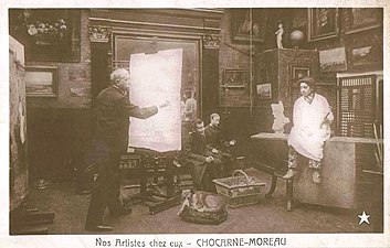 Paul Chocarne in zijn atelier met zijn modellen.