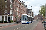 Lijn 5 met 15G-tram in de Marnixstraat; april 2021.