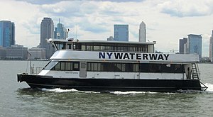 NY Waterway ferry with Jersey City skyline.jpg