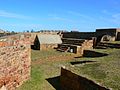 Inside the fort, soldiers house on left and ammunition store in the centre.