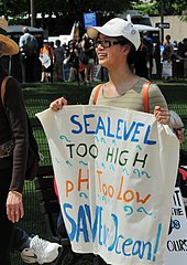 Demonstrator calling for action against ocean acidification at the People's Climate March (2017) Save our ocean, People's Climate March, 29 April 2017 (cropped).jpg