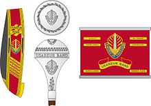 The regalia of the U.S. Army Europe Band, showing (left to right) the baldric, mace, and drum wrap USAEUR Band Regalia.jpg