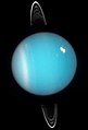 Uranus en 2005. Les anneaux, le col sud et un nuage brillant dans l'hémisphère nord sont visibles.