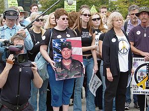 Friends and family of Cindy Sheehan hold a pho...