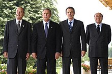 From left: French President Jacques Chirac, US President George W. Bush, British Prime Minister Tony Blair and Italian Prime minister Silvio Berlusconi at the G8 Summit at Evian, France. Chirac opposed the invasion; the other three leaders supported it. Chirac Bush Blair Berlusconi.jpg