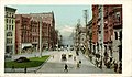Photo postcard of 1st Avenue from the early 20th century
