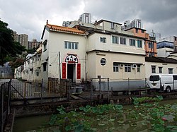 Gate tower and pond of Tai Po Tau Shui Wai.