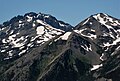 Hal Foss Peak to left with Mount Mystery looming directly behind it. Mount Fricaba to right. View from Marmot Pass.