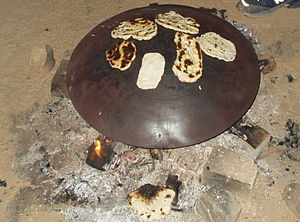 Pita fried on an outdoor fire.
