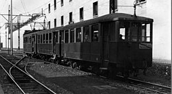 A suburban tram near the station around 1951