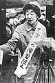 Japanese activist Yoko Matsuoka, wearing a sash of slogans, leads a Tokyo protest against U.S. military use of the Mt. Fuji firing range, in 1970