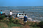 Tsunami når Marina Beach i Chennai, Indien den 26 december 2004.