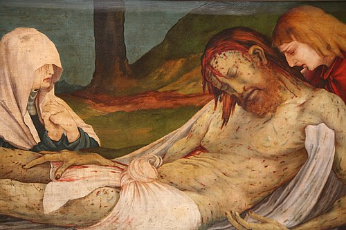 Az oltár részlete, a sebekkel borított krisztusi test ábrázolása