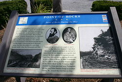 A typical roadside interpretive sign for events of the American Civil War. Note the use of a map, photographs, and text to explain the subject, sited at a relevant location. Point of rocks CWT sign may 1861.JPG