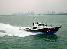 A third generation patrol craft of the Police Coast Guard conducting a sea-rescue demonstration off the southeastern coast of Singapore Police Coast Guard PT.jpg