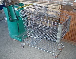English: Shopping cart with seating for 3 chil...