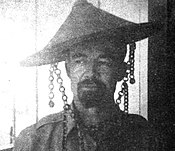 American Colonel Wendell Fertig, U.S. Army Corps of Engineers and commander of the 10th Military District, Island of Mindanao, Philippines and the resistance forces with his well-known red goatee, which he wore during the war, photo taken by unknown U.S. military photographer, circa 1942-1945 US Army Colonel Wendell Fertig With Goatee And Conical Hat, Philippines.jpg