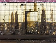 Deteriorating subway station wall at 168th Street 168 Street wall vc.jpg