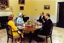 President Gerald Ford and First Lady Betty Ford host a lunch for Queen Elizabeth II and Prince Philip, Duke of Edinburgh in the President's Dining Room at the White House during Her Majesty's state visit to Washington that coincided with the United States Bicentennial celebrations in 1976. BettyFordNARA.jpg