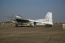 A plane on the tarmac at an airport